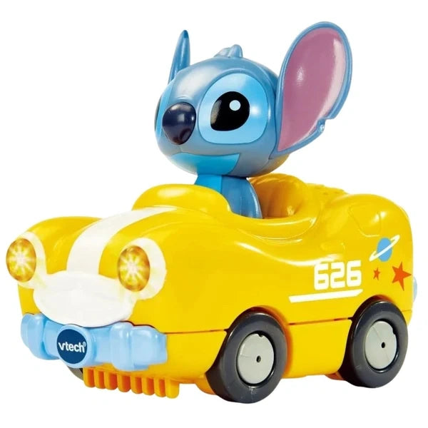 VTech Stitch Sunshine Cruiser with Stitch figure seated in a yellow car with blue details and headlights 