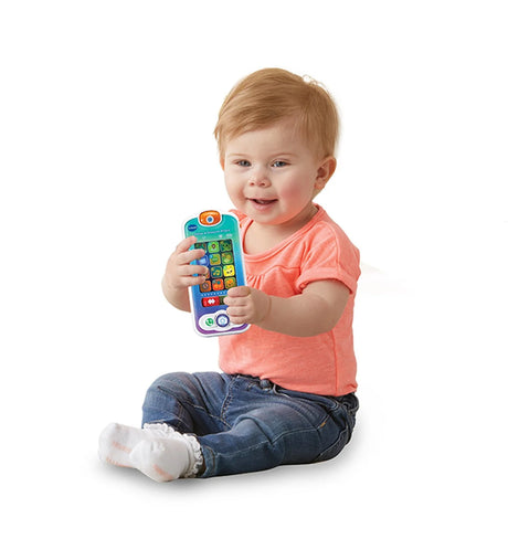 Toddler playing with VTech Swipe and Discover Phone Toy – Ireland