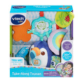 VTech Take Along Toucan in VTech baby retail box showing soft toucan toy with TRY ME panel and Birth+ age label