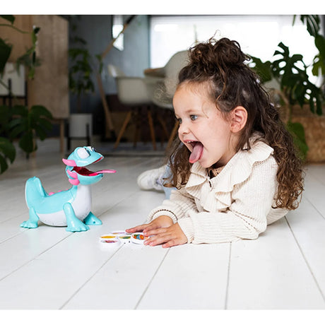 Child playing with VTech Tasty Treats Axolotl Toy and snack tokens – Ireland
