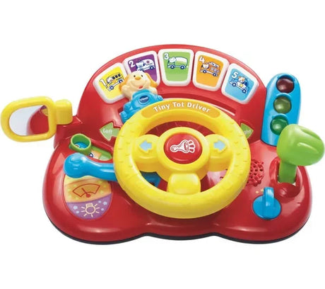 Toddler playing with VTech Tiny Tot Driver activity dashboard toy – Ireland