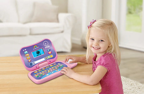 Child using the VTech Toddler Tech Laptop Pink on a table – Ireland