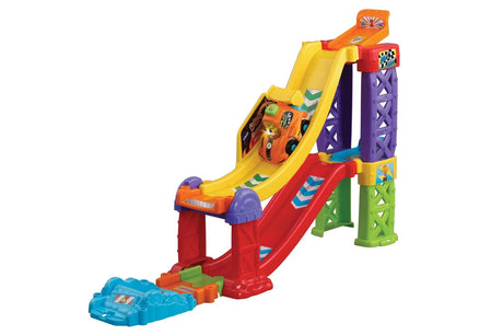 VTech Toot Toot 3 in 1 Raceway assembled in extended super raceway layout with long red ramp, yellow drop section and blue crash platform at base