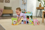 Child playing with the VTech Bluey Ice Cream Adventure Play Set and Ice Cream Truck on a rug