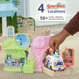 VTech Bluey Ice Cream Adventure Play Set with a hand moving the Ice Cream Truck beside the pink and green play areas