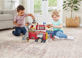 Children playing with the VTech Toot-Toot Drivers Fire Station, track and Fire Engine