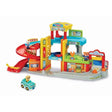 VTech Toot-Toot Drivers Roll & Repair Garage with red spiral ramp, vehicle lift, car wash and included roadster