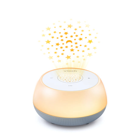 Front view of the glowing VTech V-Hush Mini Sleep Soother projecting yellow stars and moons