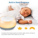 Sleeping baby beside the glowing VTech V-Hush Mini Sleep Soother with sleep program graphics