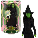 Elphaba singing doll from the Wicked movie shown in retail packaging with black gown, pointed hat, and Defying Gravity sound callout