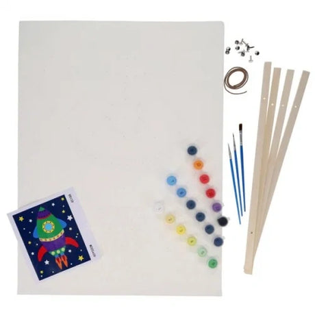 World of Colour Rocket Canvas Art Scroll showing blank canvas, rocket guide sheet, paint pots, brushes, wooden frame pieces and hanging cord
