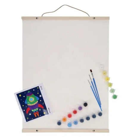 World of Colour Rocket Canvas Art Scroll showing hanging canvas with rocket guide sheet, paint pots and brushes