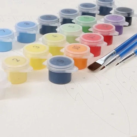 World of Colour Rocket Canvas Art Scroll close view showing paint pots and brushes on the canvas