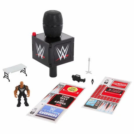 WWE Microphone Playset with The Rock figure, stickers, and accessories displayed in Ireland.