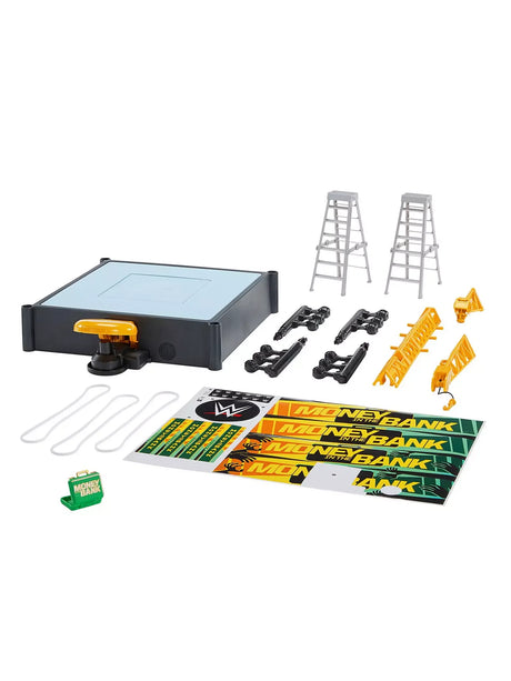 WWE Cash-In Ring Playset contents with ring base, ladders, crane parts, and accessories in Ireland.