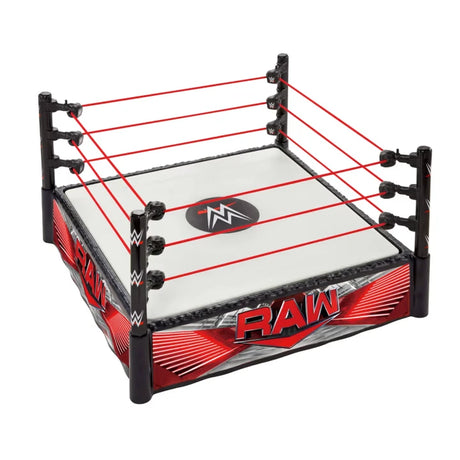 WWE Superstar Ring assembled with RAW apron labels, red Pro Tension ropes and WWE logo on the ring mat