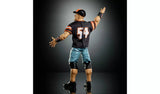 Rear view of the WWE WrestleMania Elite John Cena action figure wearing the number 54 jersey and blue shorts with arms outstretched