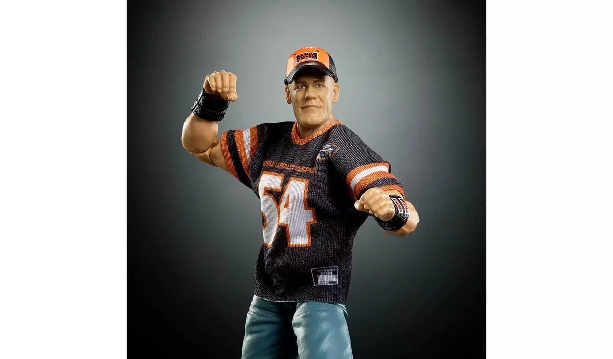WWE WrestleMania Elite John Cena action figure wearing the number 54 Hustle Loyalty Respect dark jersey with orange trim and cap, posed in a fighting stance
