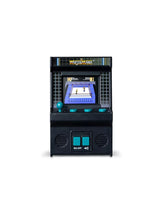 WWE WrestleMania Handheld Electronic Arcade Game front view showing black cabinet, WrestleMania header, colour screen with wrestling ring gameplay, teal joystick, four action buttons and on/off controls