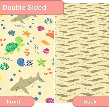 Double-sided view of XPE nursery mat showing sea life print on the front and a grey wave pattern on the reverse