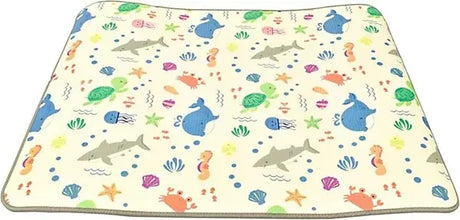 XPE nursery play mat with cream background and colourful sea life print featuring sharks, turtles, crabs, starfish, seahorses, and jellyfish