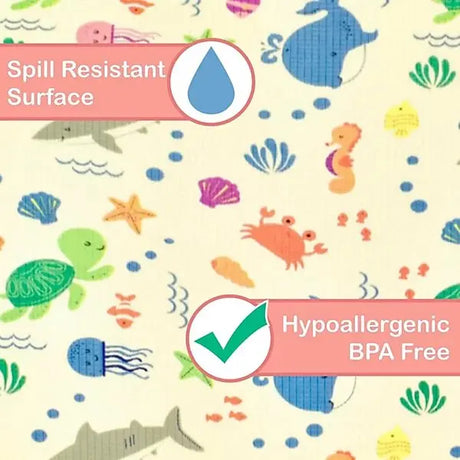 Close-up of sea life print surface on XPE nursery mat with spill resistant and hypoallergenic BPA free labels
