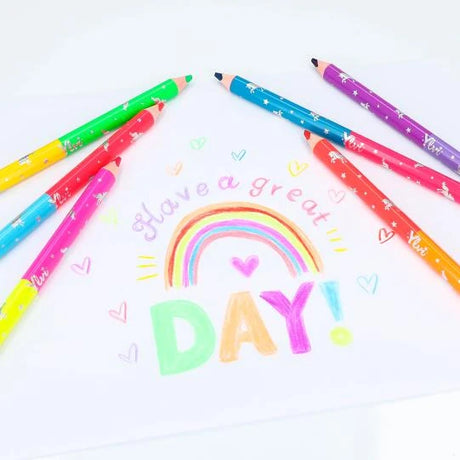 Ylvi Duo Colouring Pencils arranged around a colourful rainbow drawing