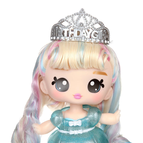 Close up of Yummiland Callie Birthday Cake doll with birthday tiara and pastel hair