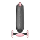 Underside view of a Yvolution Glider Kiwi scooter with a black deck, rear brake, and two pink rear wheels.