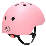 Pink Yvolution kids helmet rear view showing vents, logo, and adjustment dial on a white background