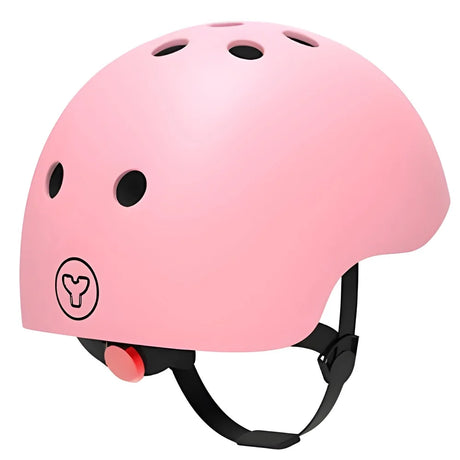 Pink Yvolution kids helmet rear view showing vents, logo, and adjustment dial on a white background