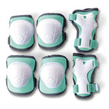 Green multi piece safety pad set for young riders on a clean white background