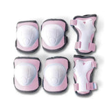 Pink protective pads showing cushioned shells and wrist guards arranged clearly for viewing