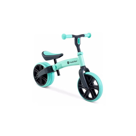 Yvolution Velo Junior Balance Bike Green shown from the side with front wheel facing forward