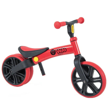 Yvolution Velo Junior Balance Bike Red shown from the side with red frame and red tyres and black wheels.