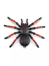Top view of Zuru Robo Alive Giant Tarantula with black, red and yellow legs